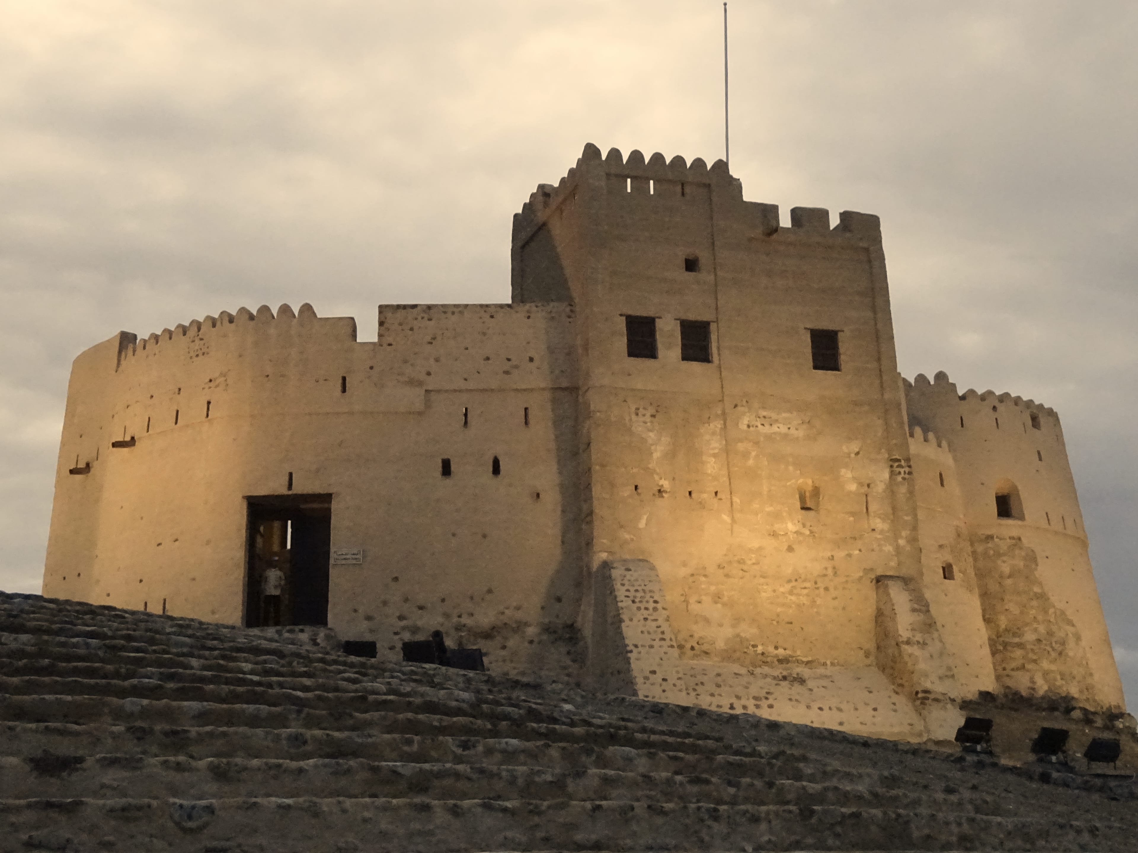 Fujairah Fort glowing in the evening light